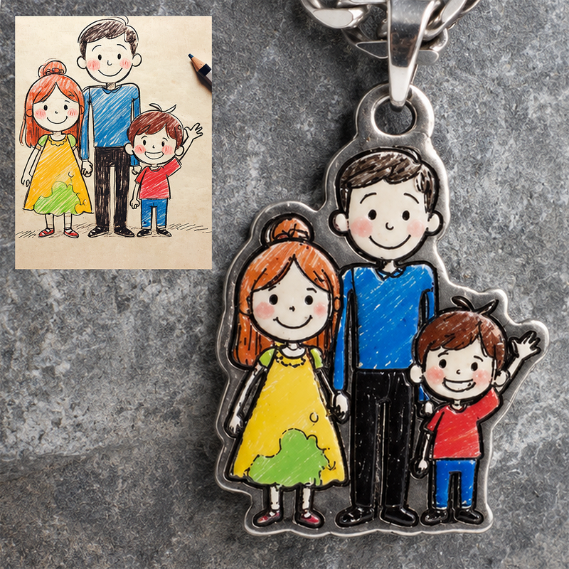 Metal family pendant with cartoon-style illustration of a family, next to a hand-drawn illustration of the same family on a gray surface.